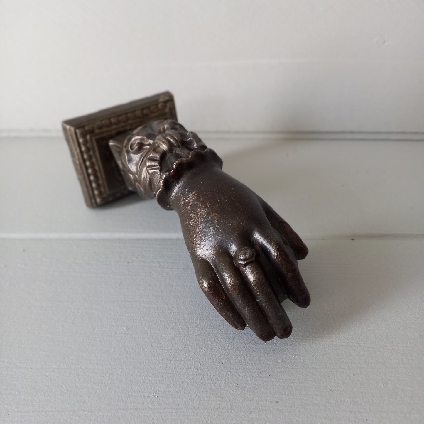 French antique woman's hand door knocker made from decorative cast iron