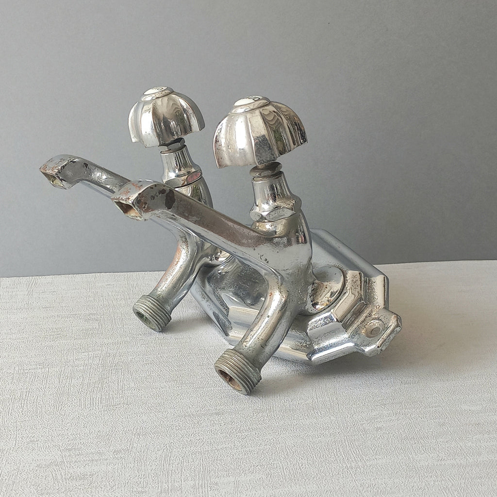 Stylish French vintage hot and cold faucet taps that are heavy, quality pieces probably dating from the 1930s time-frame. These old taps are being sold only as a restoration piece or project.