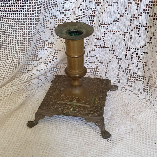 Small decorative brass candle stick holder with four little feet from France, antique shabby chic chamber stick