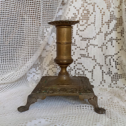 Small decorative brass candle stick holder with four little feet from France, antique shabby chic chamber stick