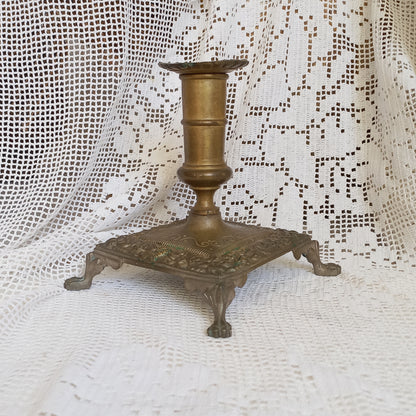 Small decorative brass candle stick holder with four little feet from France, antique shabby chic chamber stick