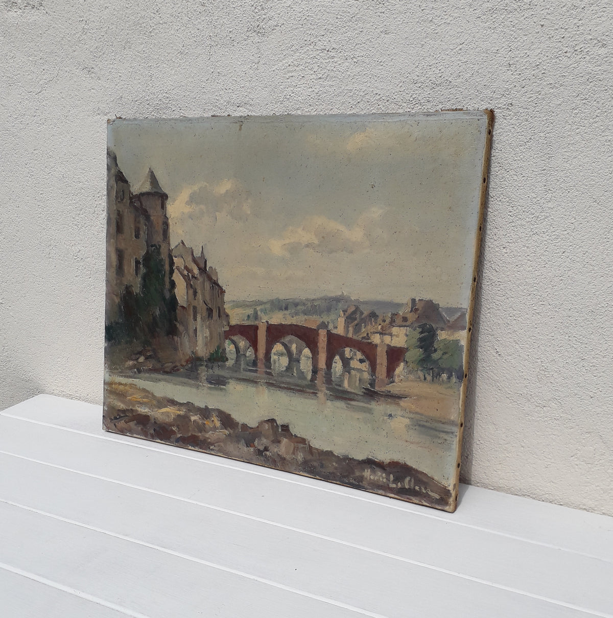 An exciting find and truly fabulous French vintage/antique oil painting depicting the old bridges of Espalion, Aveyron in France. The painting is signed Henri Le Clerc. Stretched canvas on wooden frame; to the rear on the wooden stretcher in very faded pencil is the location - my google search bought up a current view of this scene and little has changed. There is no date, although I guesstimate this painting to have been created in the early to mid 20th century.