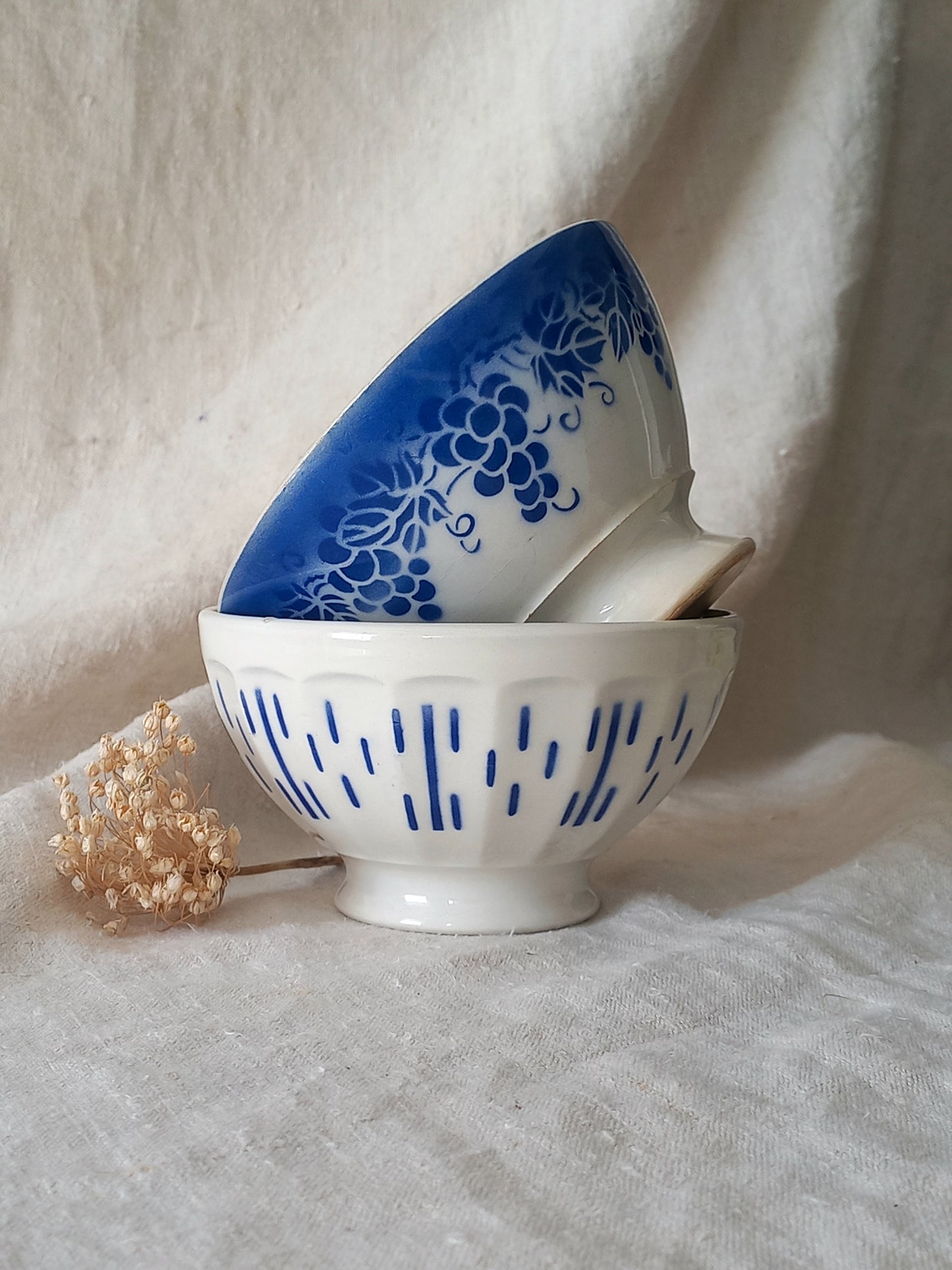 Ceramic bowls with blue patterns on a light background