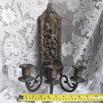 Antique wall mounted bronze candle holder with cherubs, French antique candle sconce