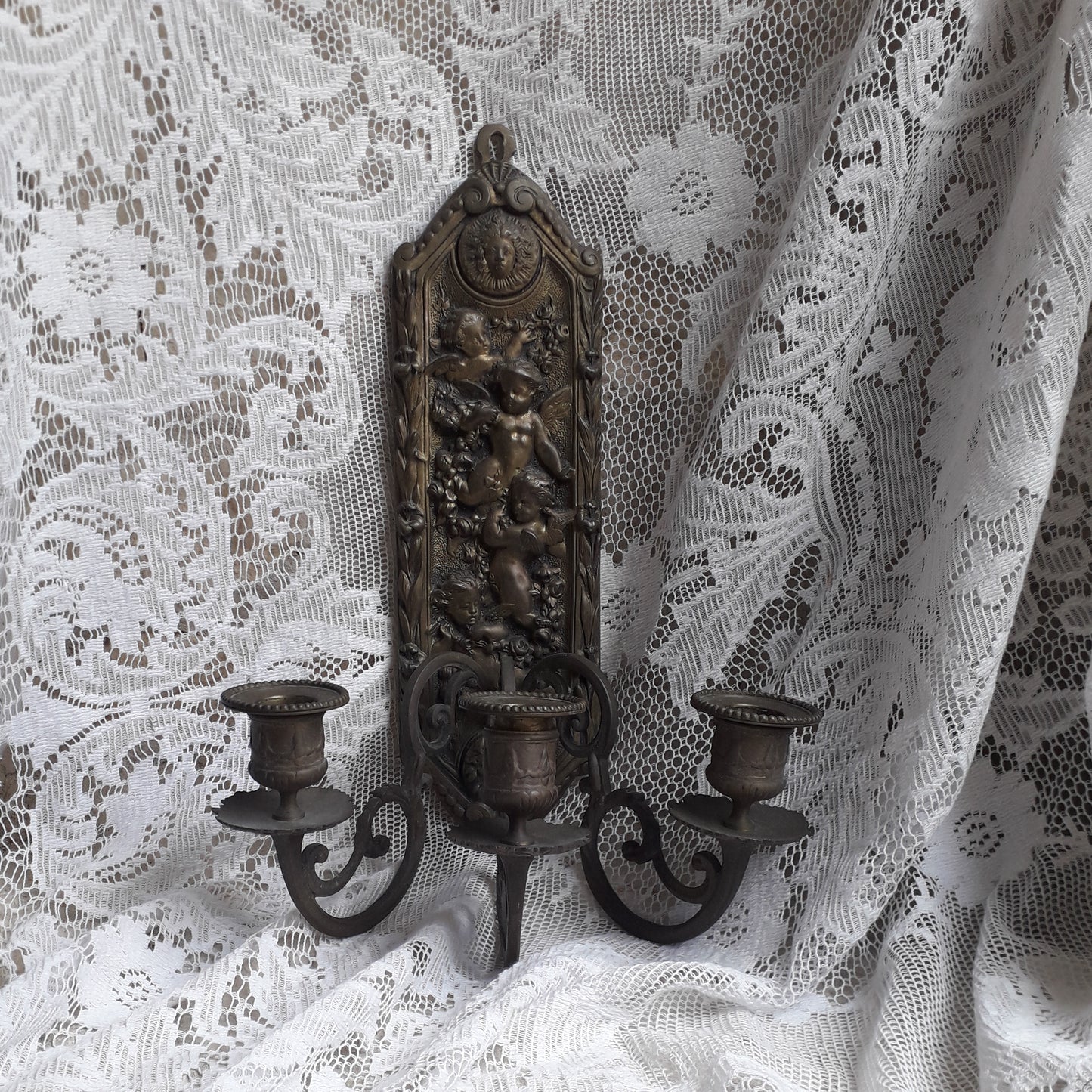 Antique wall mounted bronze candle holder with cherubs, French antique candle sconce