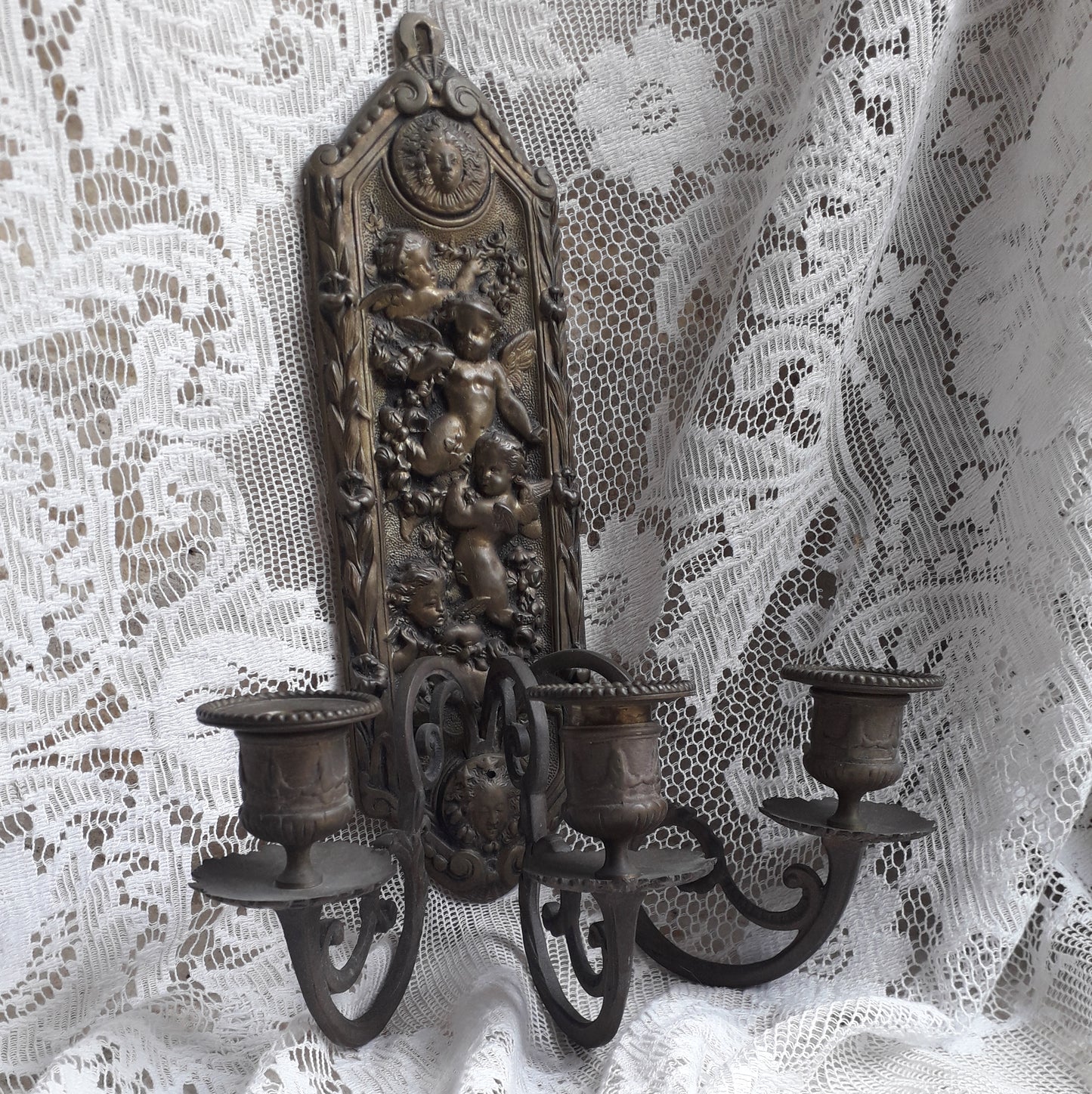 Antique wall mounted bronze candle holder with cherubs, French antique candle sconce