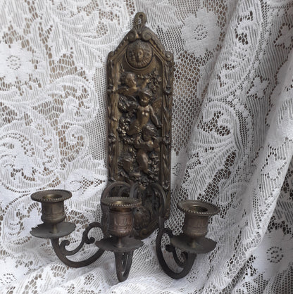 Antique wall mounted bronze candle holder with cherubs, French antique candle sconce