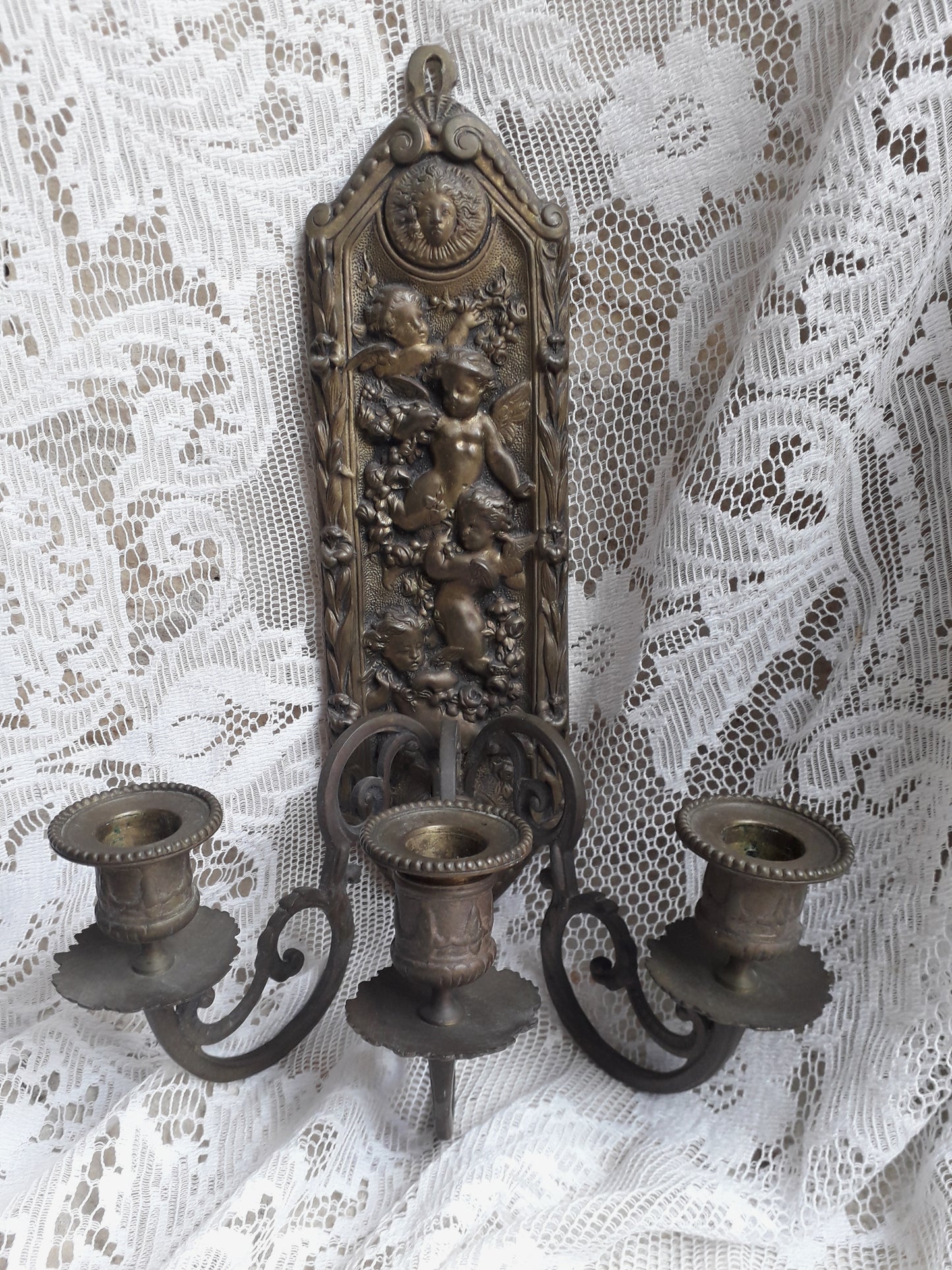 Antique wall mounted bronze candle holder with cherubs, French antique candle sconce