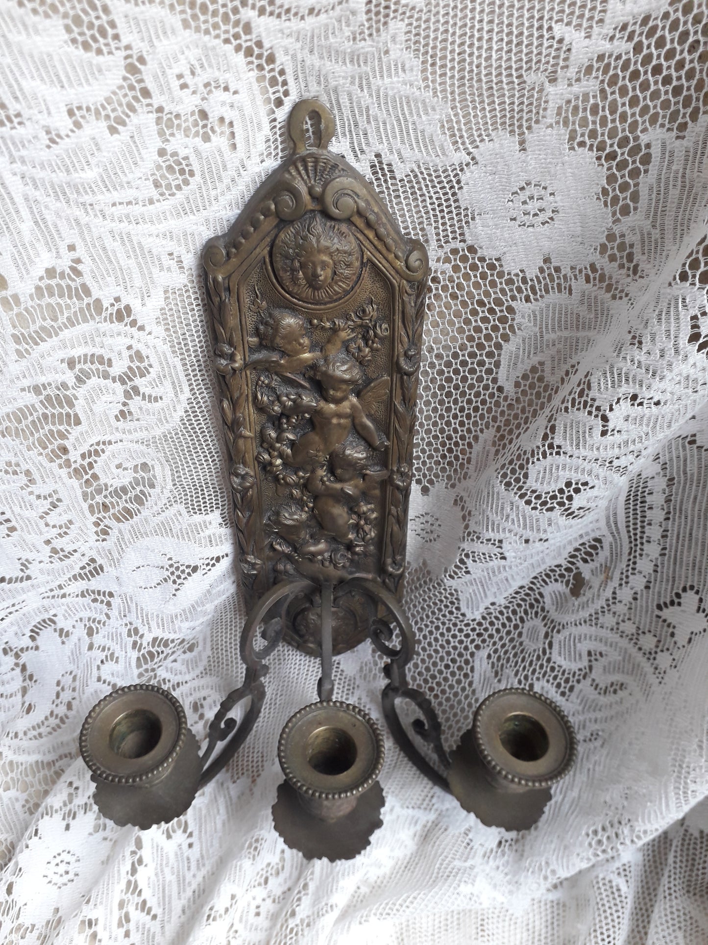 Antique wall mounted bronze candle holder with cherubs, French antique candle sconce