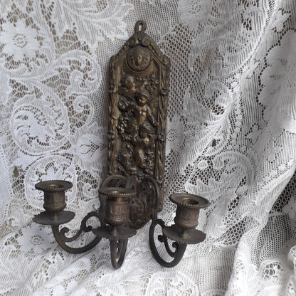 Antique wall mounted bronze candle holder with cherubs, French antique candle sconce