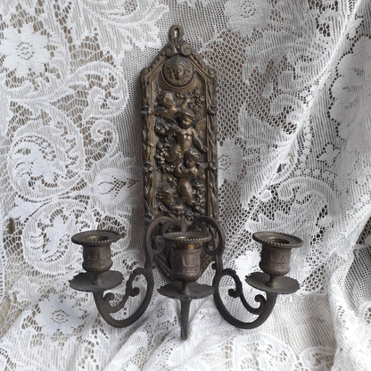 Antique wall mounted bronze candle holder with cherubs, French antique candle sconce