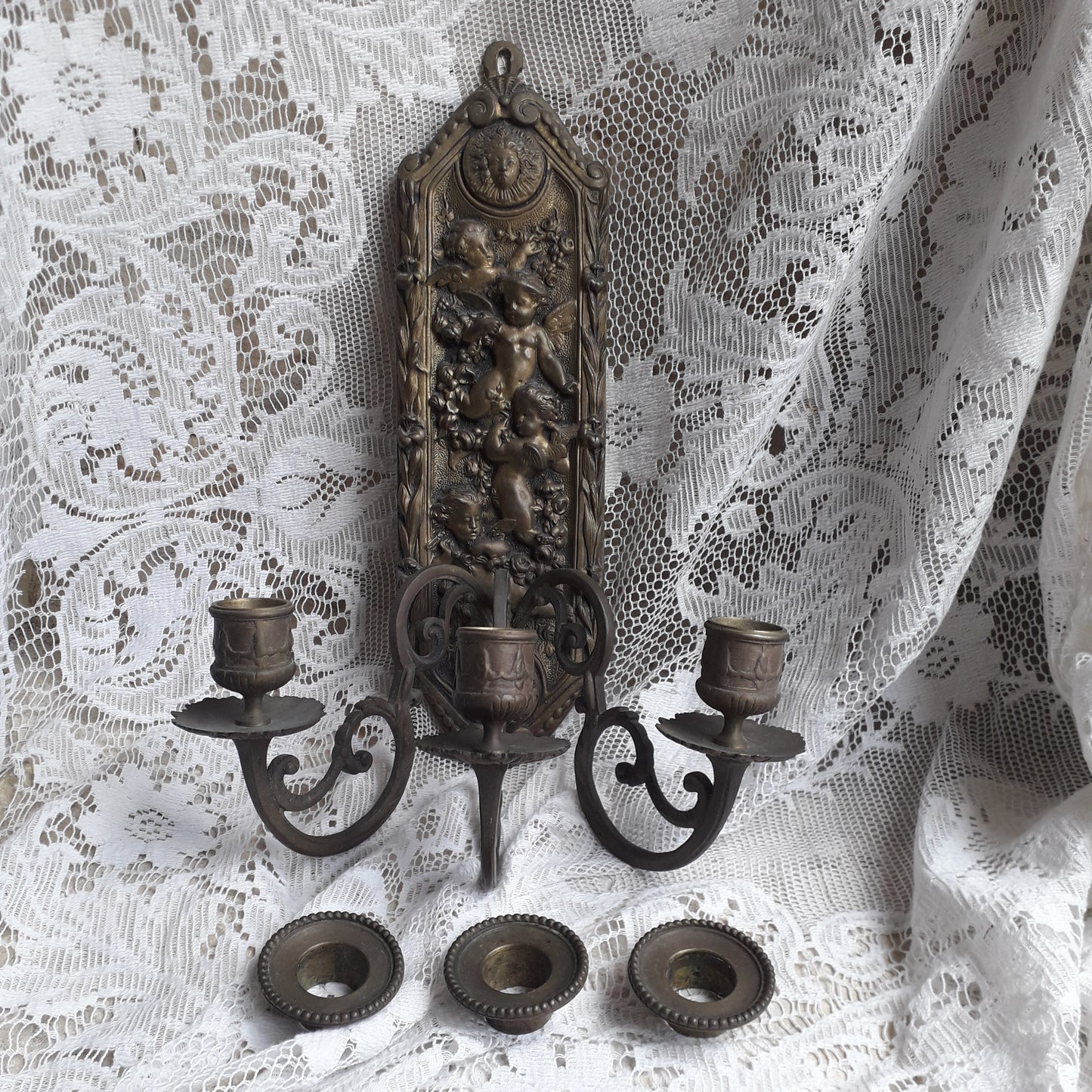 Antique wall mounted bronze candle holder with cherubs, French antique candle sconce