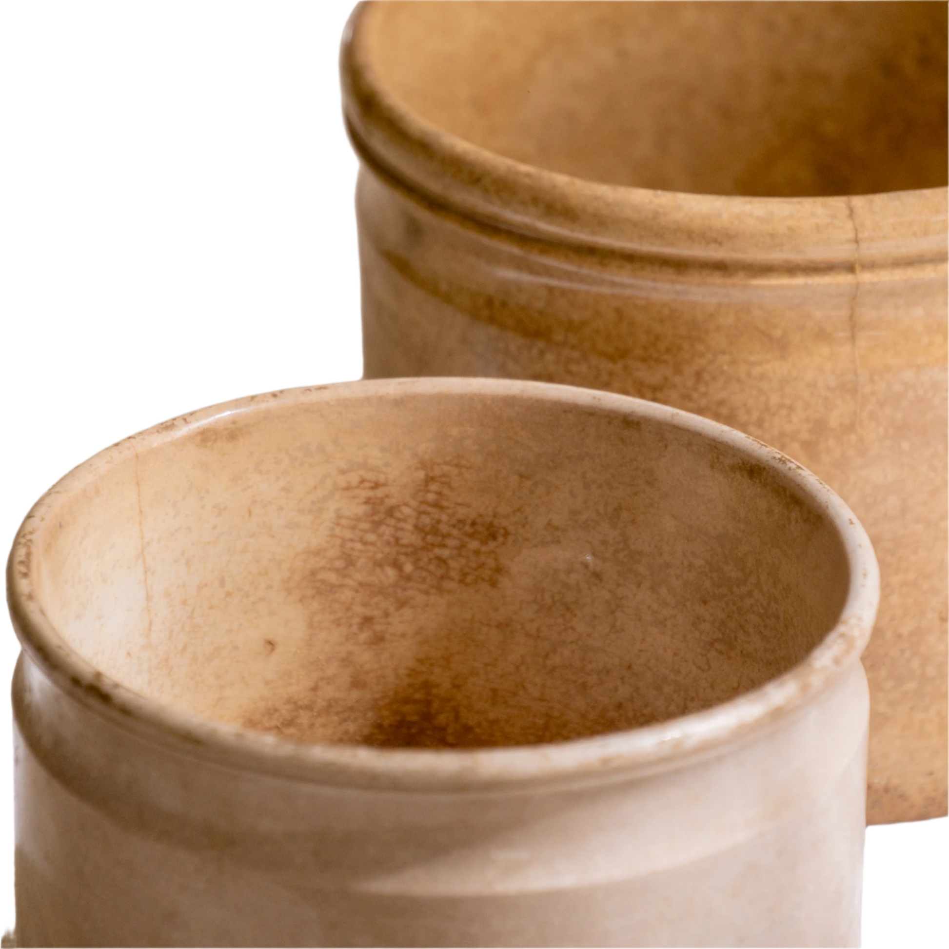 A pair of French antique tea-stained white to creamy brown ironstone crock pots or preserve pots.

In the past these small pots were quintessential pieces in French kitchens for storing jam, etc, and these days are still just as useful for items such as utensils.

Smaller pot was manufactured by Choisy le Roi, circa. late 1800s. The larger pot has no maker's mark - circa. late 1800s/early 1900s.