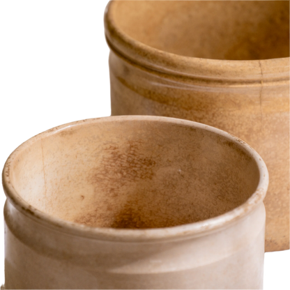 A pair of French antique tea-stained white to creamy brown ironstone crock pots or preserve pots.

In the past these small pots were quintessential pieces in French kitchens for storing jam, etc, and these days are still just as useful for items such as utensils.

Smaller pot was manufactured by Choisy le Roi, circa. late 1800s. The larger pot has no maker's mark - circa. late 1800s/early 1900s.