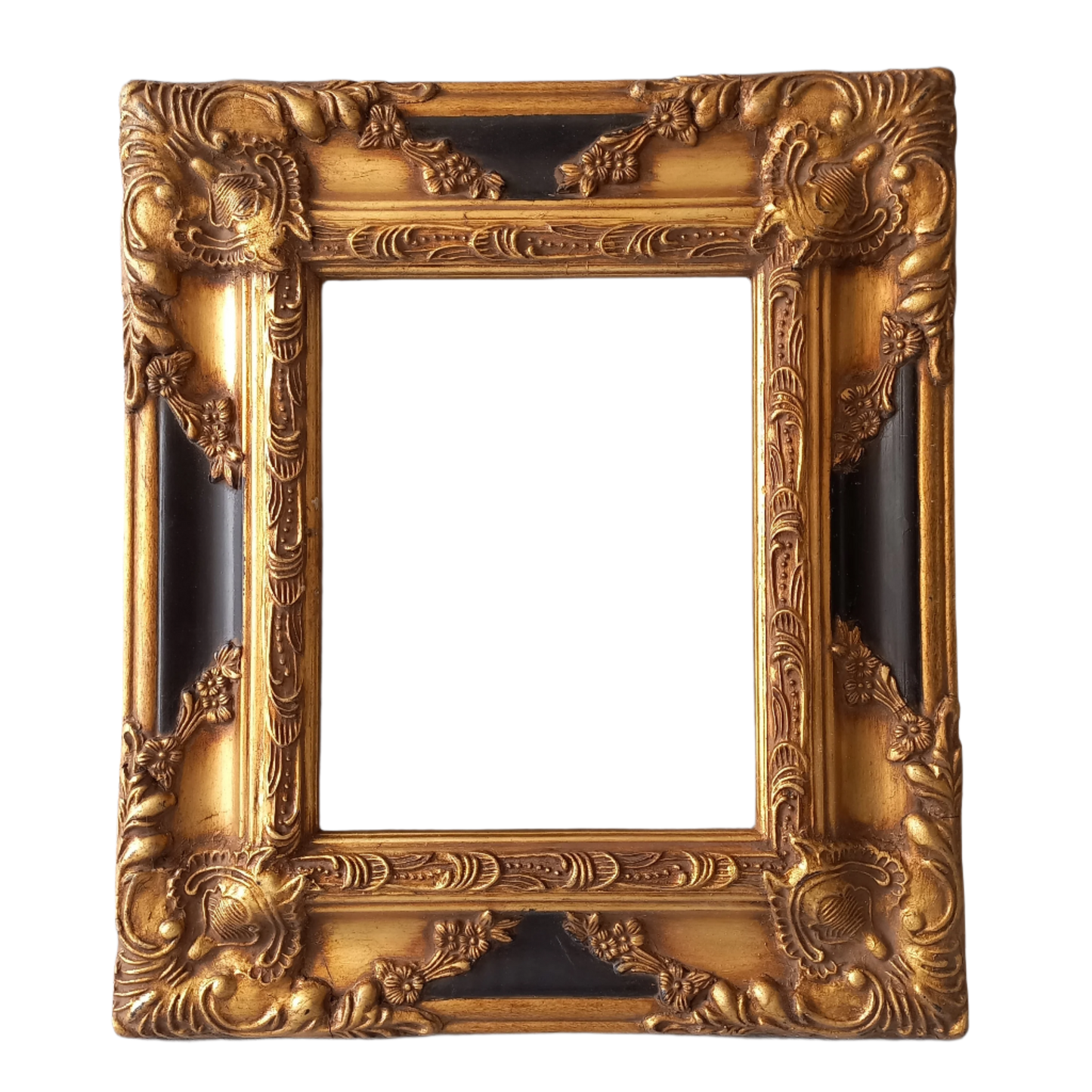 Stunning vintage frame for a painting or photo with ornate decoration in an antique style from France. This frame is a solid and heavy piece, seems to be wooden although we also think there might be some plaster so we are calling it a frame made of mixed materials.