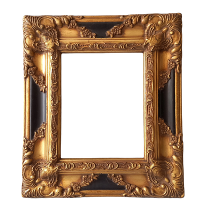 Stunning vintage frame for a painting or photo with ornate decoration in an antique style from France. This frame is a solid and heavy piece, seems to be wooden although we also think there might be some plaster so we are calling it a frame made of mixed materials.