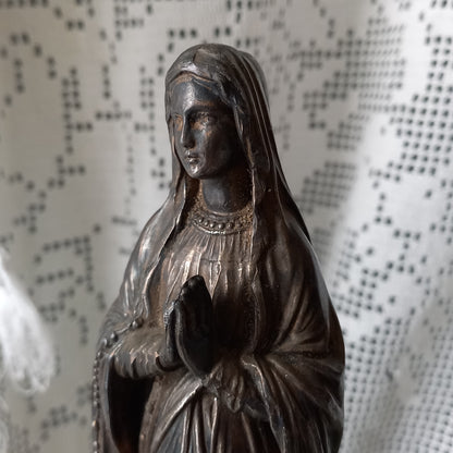 Small Virgin Mary religious figurine made from metal, French religious souvenir from Lourdes