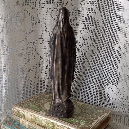 Small Virgin Mary religious figurine made from metal, French religious souvenir from Lourdes