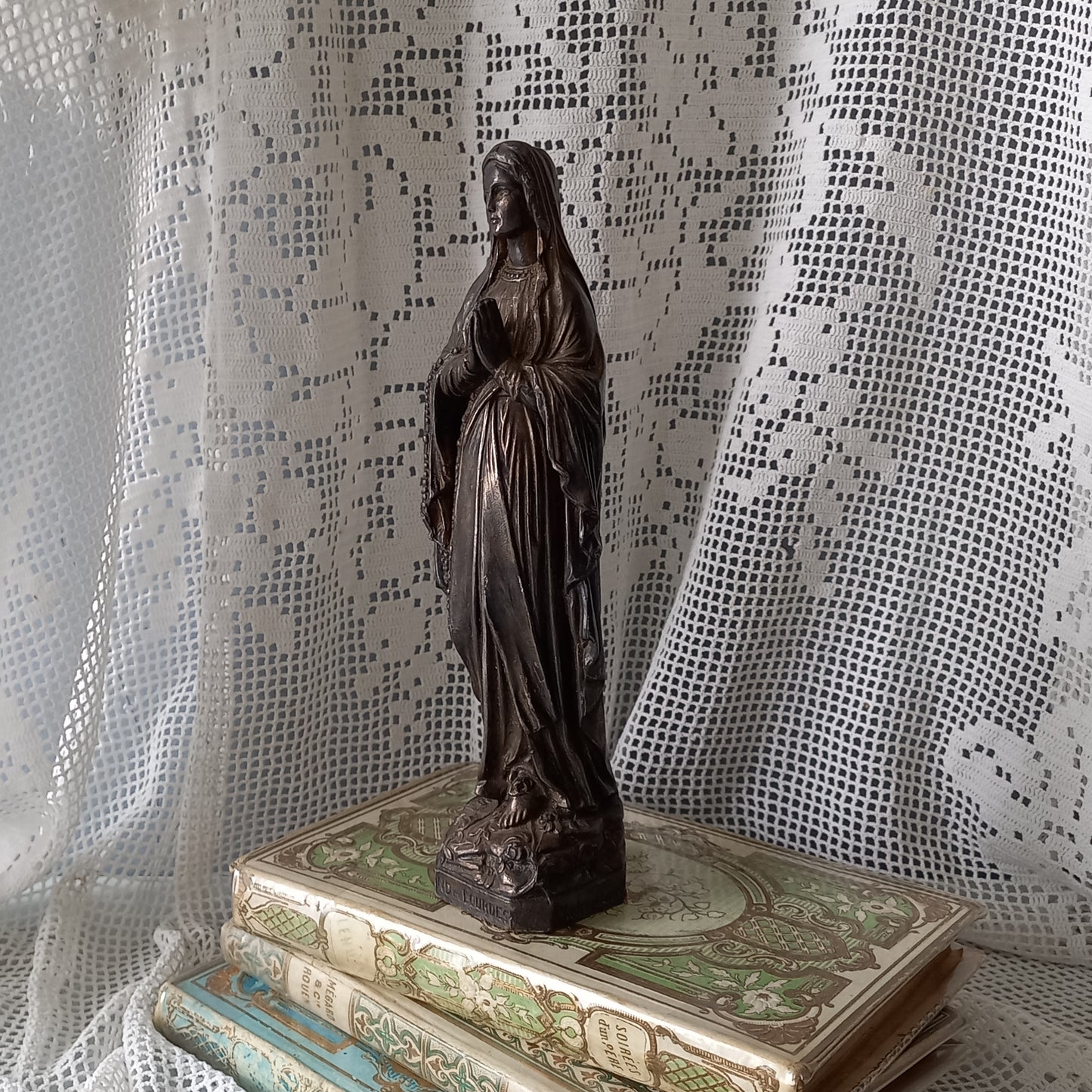 Small Virgin Mary religious figurine made from metal, French religious souvenir from Lourdes