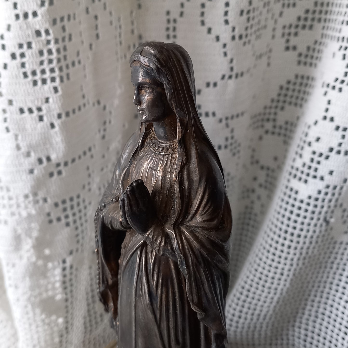 Small Virgin Mary religious figurine made from metal, French religious souvenir from Lourdes