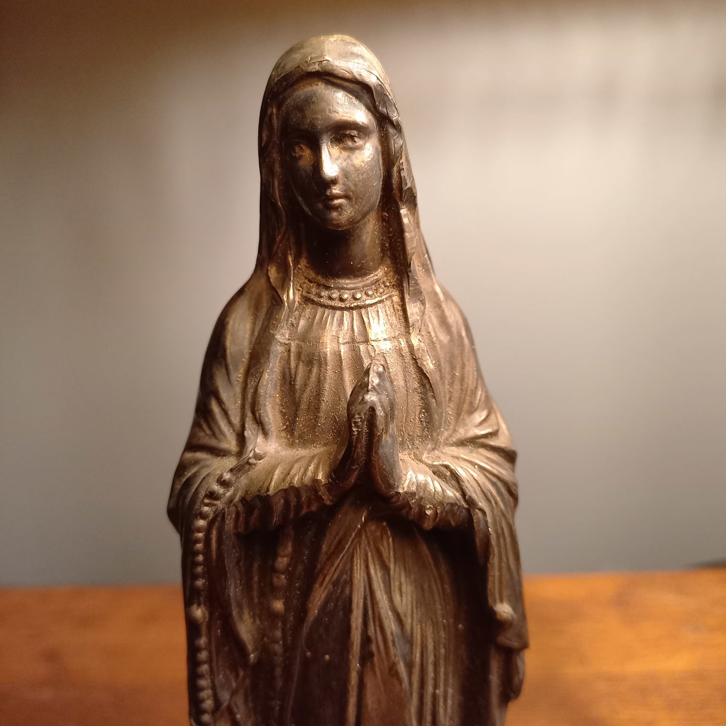 Small Virgin Mary religious figurine made from metal, French religious souvenir from Lourdes