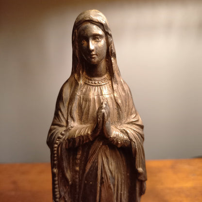 Small Virgin Mary religious figurine made from metal, French religious souvenir from Lourdes