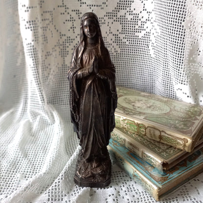 Small Virgin Mary religious figurine made from metal, French religious souvenir from Lourdes