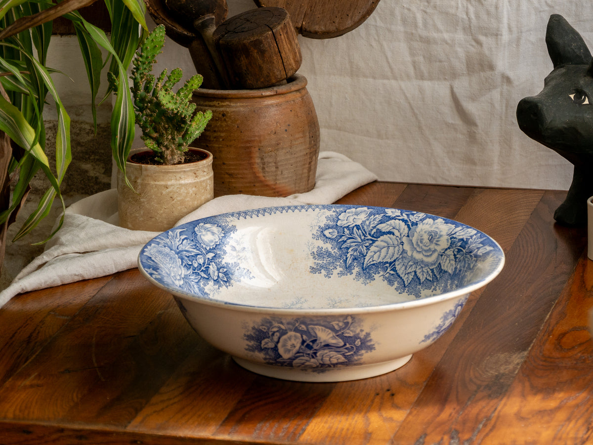 A large and beautiful antique white ironstone bowl or wash basin with blue floral pattern by premier French manufacturer, Sarreguemines.
This piece is circa. 1875 - 1900 so well over 100 years old! 
A stunning piece of original antique ironstone from France that will make excellent home decor.
