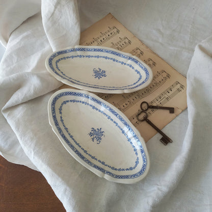 A beautiful pair of French vintage white ironstone side plates or raviers with attractive blue designs. These particular pieces were manufactured by Gien.