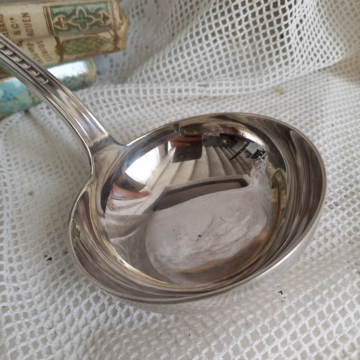 An elegant French vintage/antique silver-plated ladle with maker's stamps - a really nice decorative piece of flatware with a heavy, quality feel.