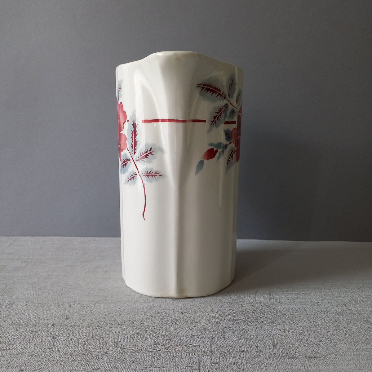 A French vintage ironstone pitcher jug with pink/red floral transfer pattern, once part of a wash-set, this beautiful and very heavy, tall jug/pitcher makes a wonderful piece of vintage decor. Maker's mark is underneath.