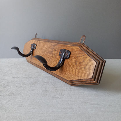 French vintage wooden coat rack with two metal coat hooks