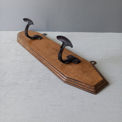 French vintage wooden coat rack with two metal coat hooks