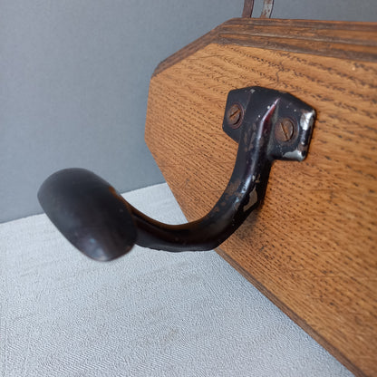 French vintage wooden coat rack with two metal coat hooks