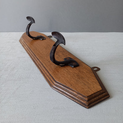 French vintage wooden coat rack with two metal coat hooks