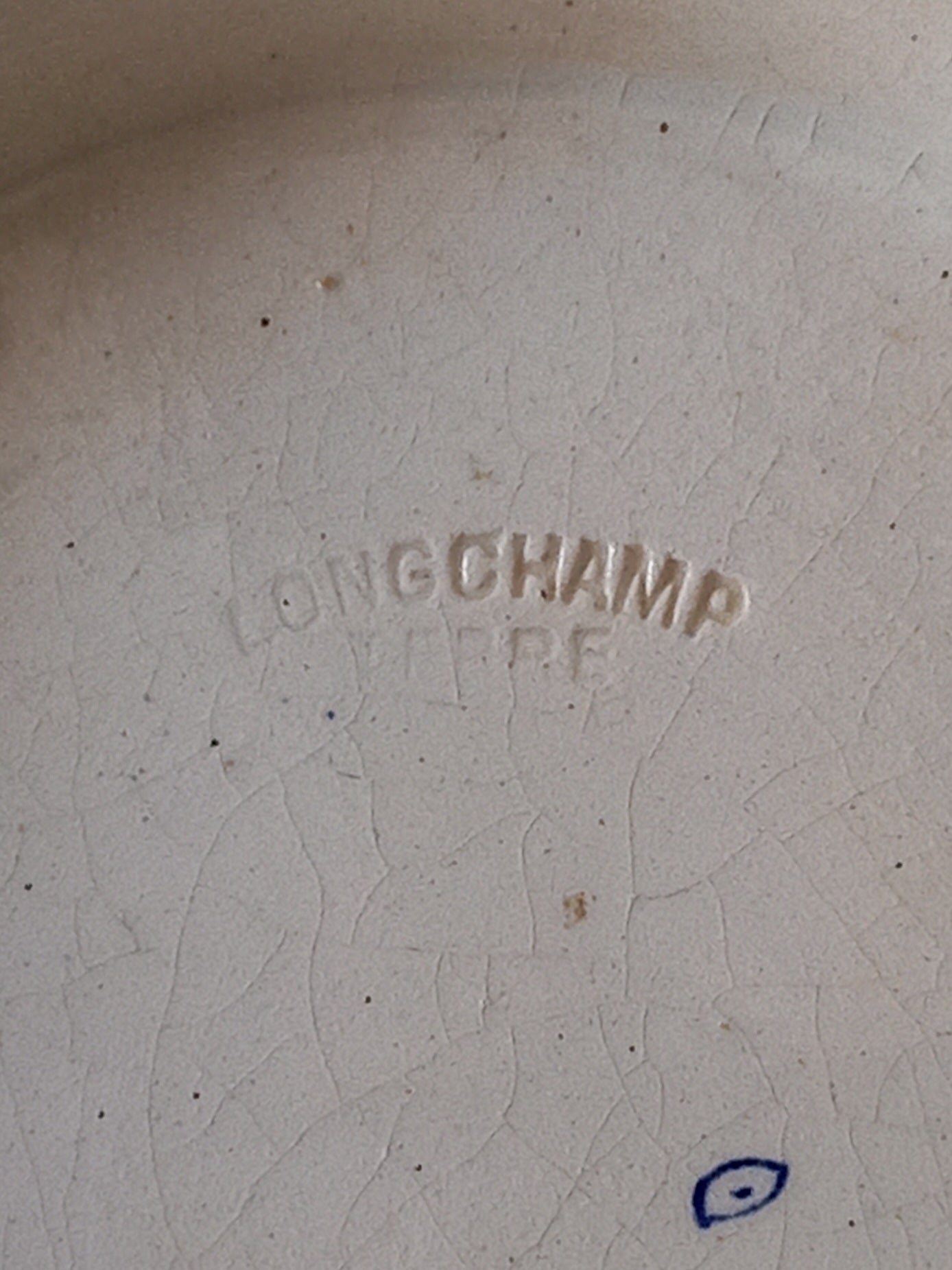 Maker's mark underneath an antique bowl