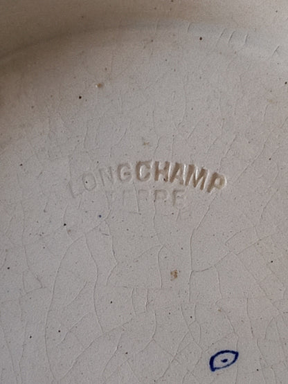 Maker's mark underneath an antique bowl