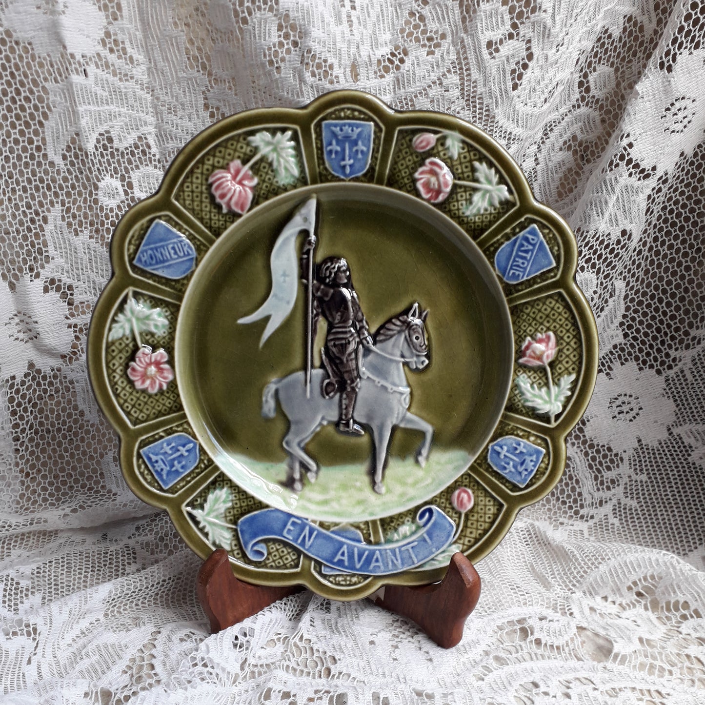 Small French antique majolica Joan of Arc wall plate, green Jeanne D'Arc wall plate