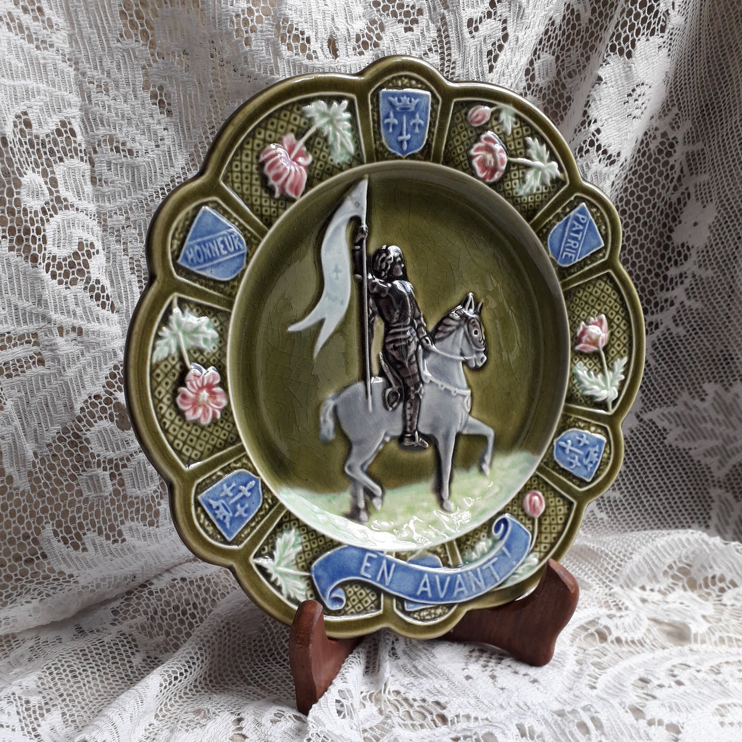 Small French antique majolica Joan of Arc wall plate, green Jeanne D'Arc wall plate