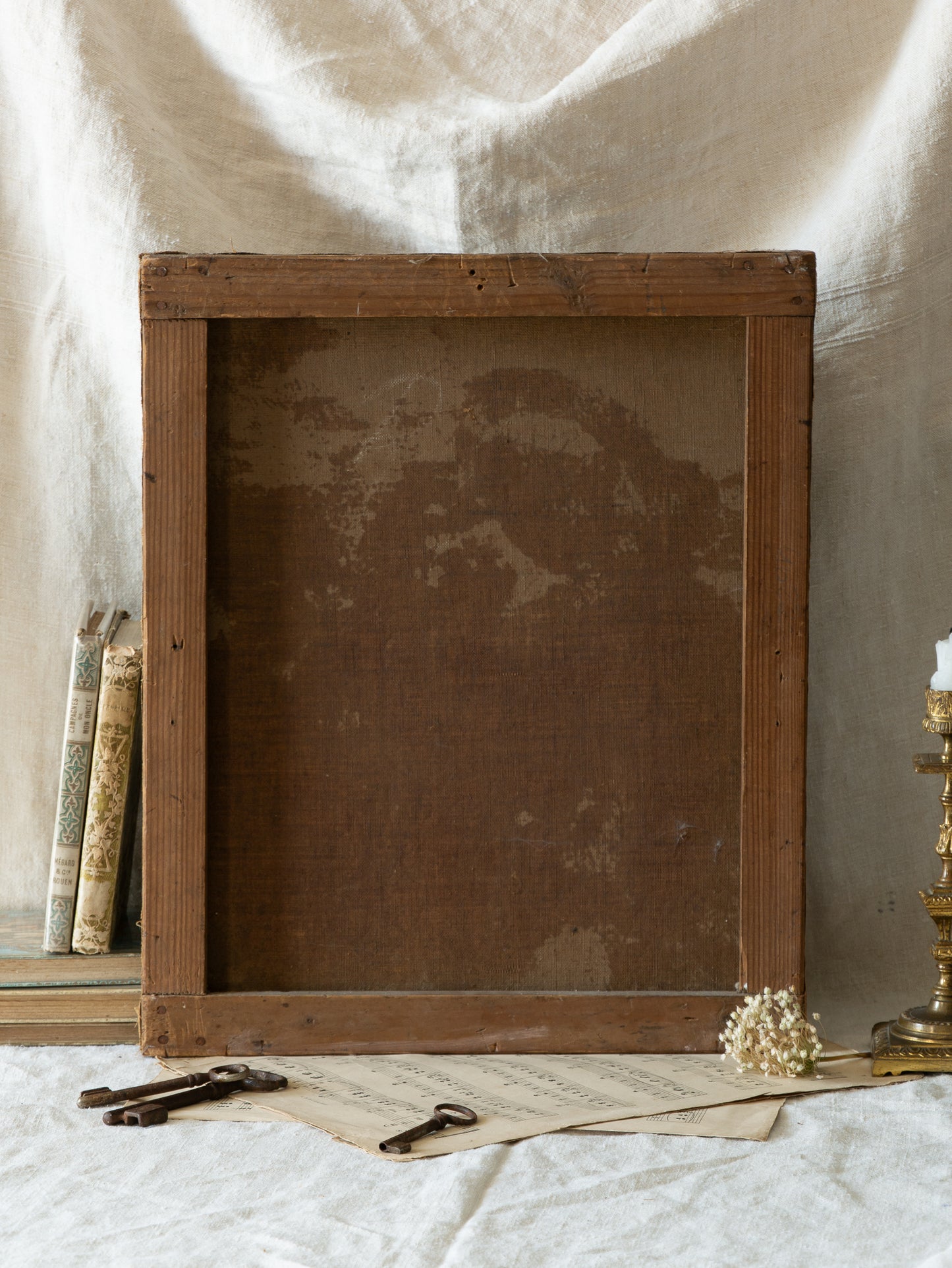 A late 19th-century/early 20th century after Raphael oil painting based on Madonna della Sedia (1513–1514, Pitti Palace, Florence). The artist (perhaps a student of the time) adapts Raphael’s tondo into a rectangular canvas, preserving the iconic green dress with patterned sleeve, the tender embrace, and the young St. John at right against a deep ground.