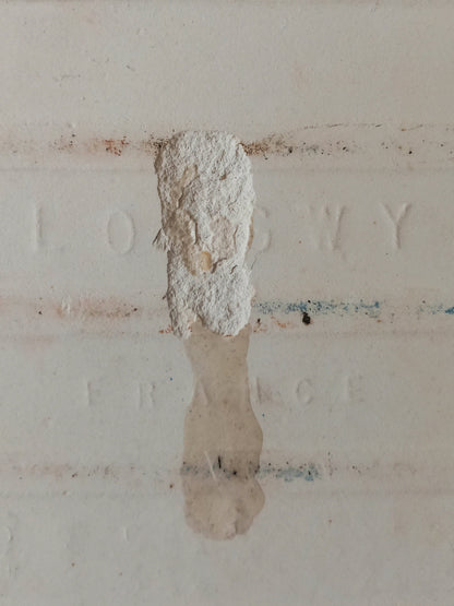 Rear of antique ceramic tile with maker's mark