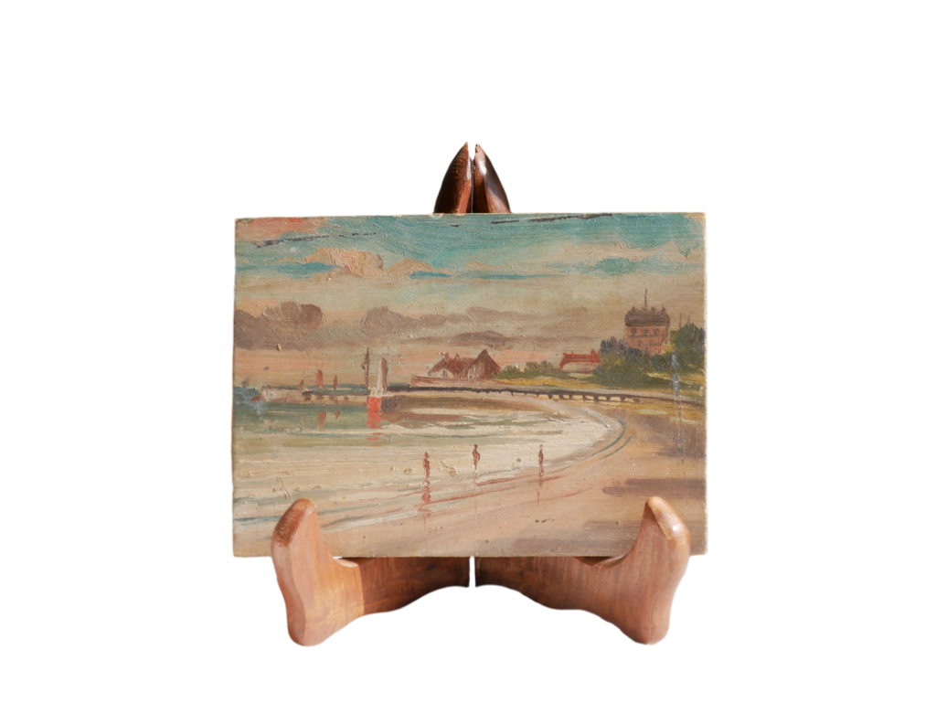 A beautiful pair of small coastal beach paintings on little wooden boards. Each original painting is wonderfully rendered with delightful and moody colours. The artist has signed one painting.

These original pieces of art look great displayed against a wall or on a mantelpiece, etc, and would also look equally nice on miniature easels as seen in two of our photos, or framed and on the wall - many possibilities!