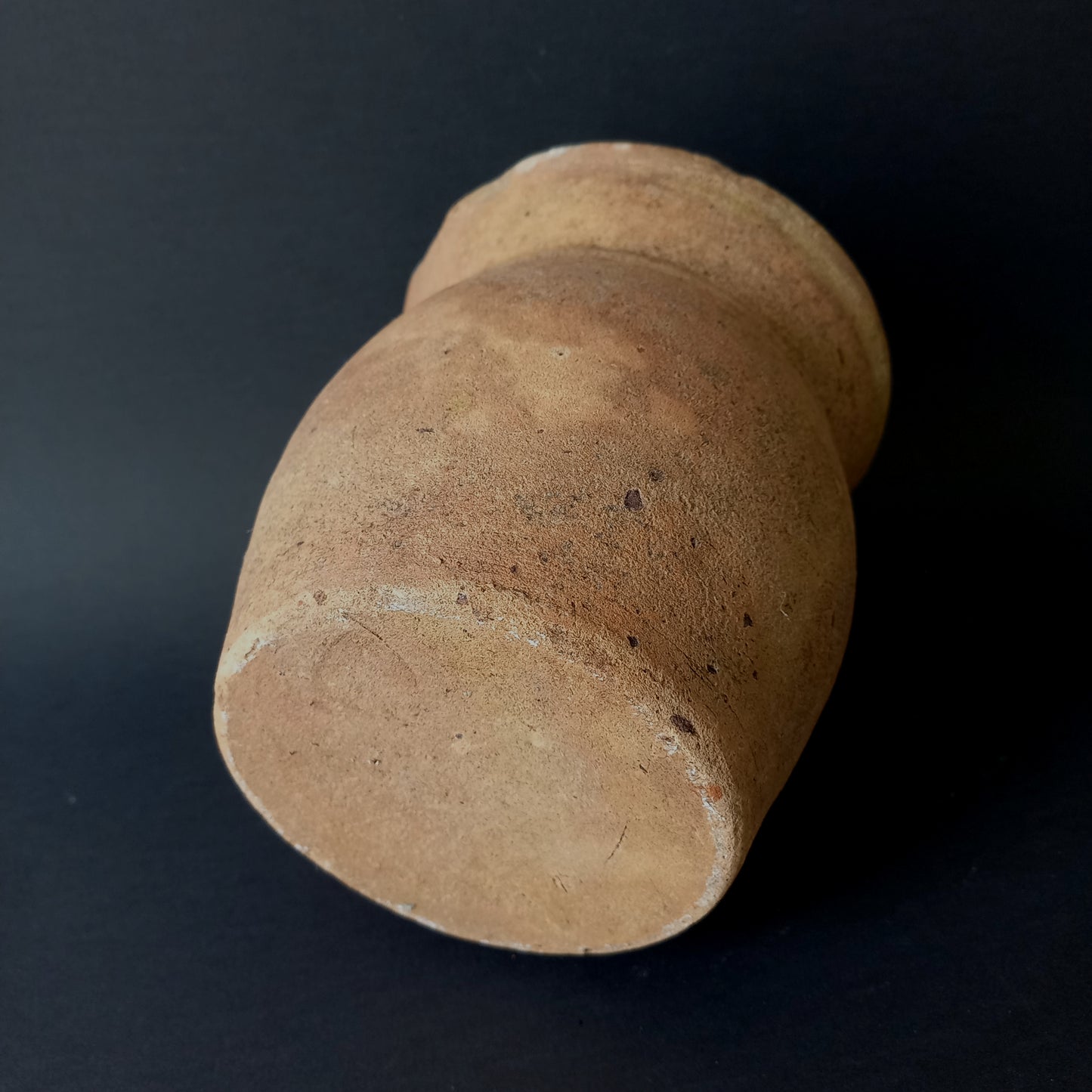 Small rustic vintage pottery jug with ochre glazed interior from France