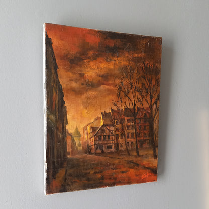 Painting of a cityscape with buildings and trees on a gray background