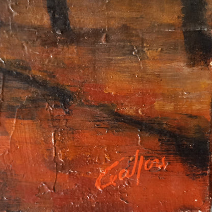 Close-up of a signature on a textured surface with a blurred background