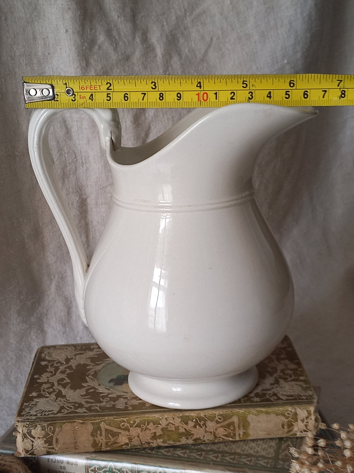 Small antique white ironstone/earthenware jug by premier French manufacturer, Sarreguemines.