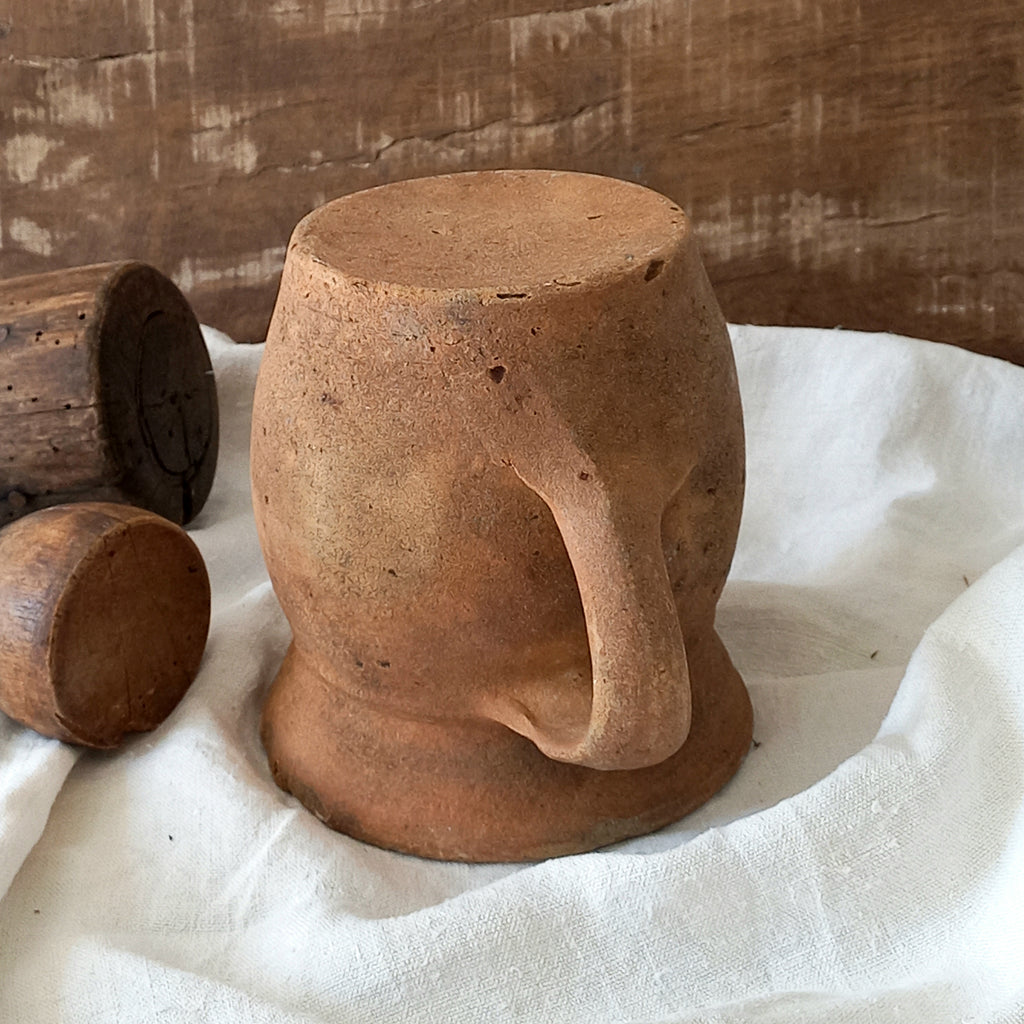 A little antique stoneware jug with a glazed interior in a wonderful shade of ochre, so rustic! This piece of pottery has aged beautifully and with its uneven worn edges and earthy rough texture it's perfect for a rustic, country or farmhouse interior.