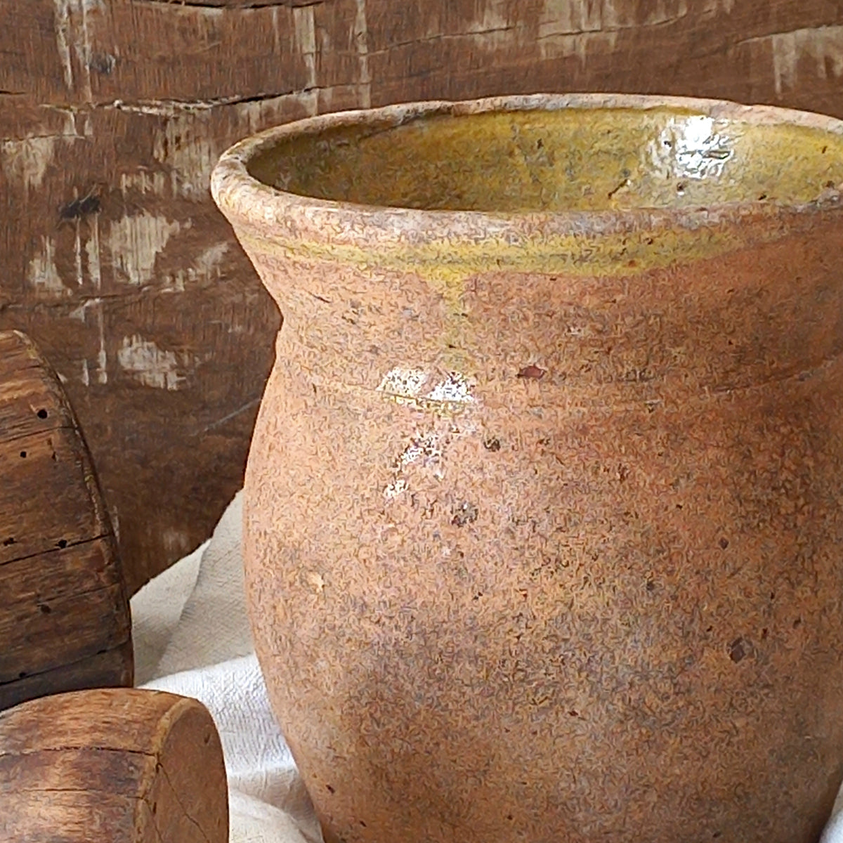 A little antique stoneware jug with a glazed interior in a wonderful shade of ochre, so rustic! This piece of pottery has aged beautifully and with its uneven worn edges and earthy rough texture it's perfect for a rustic, country or farmhouse interior.