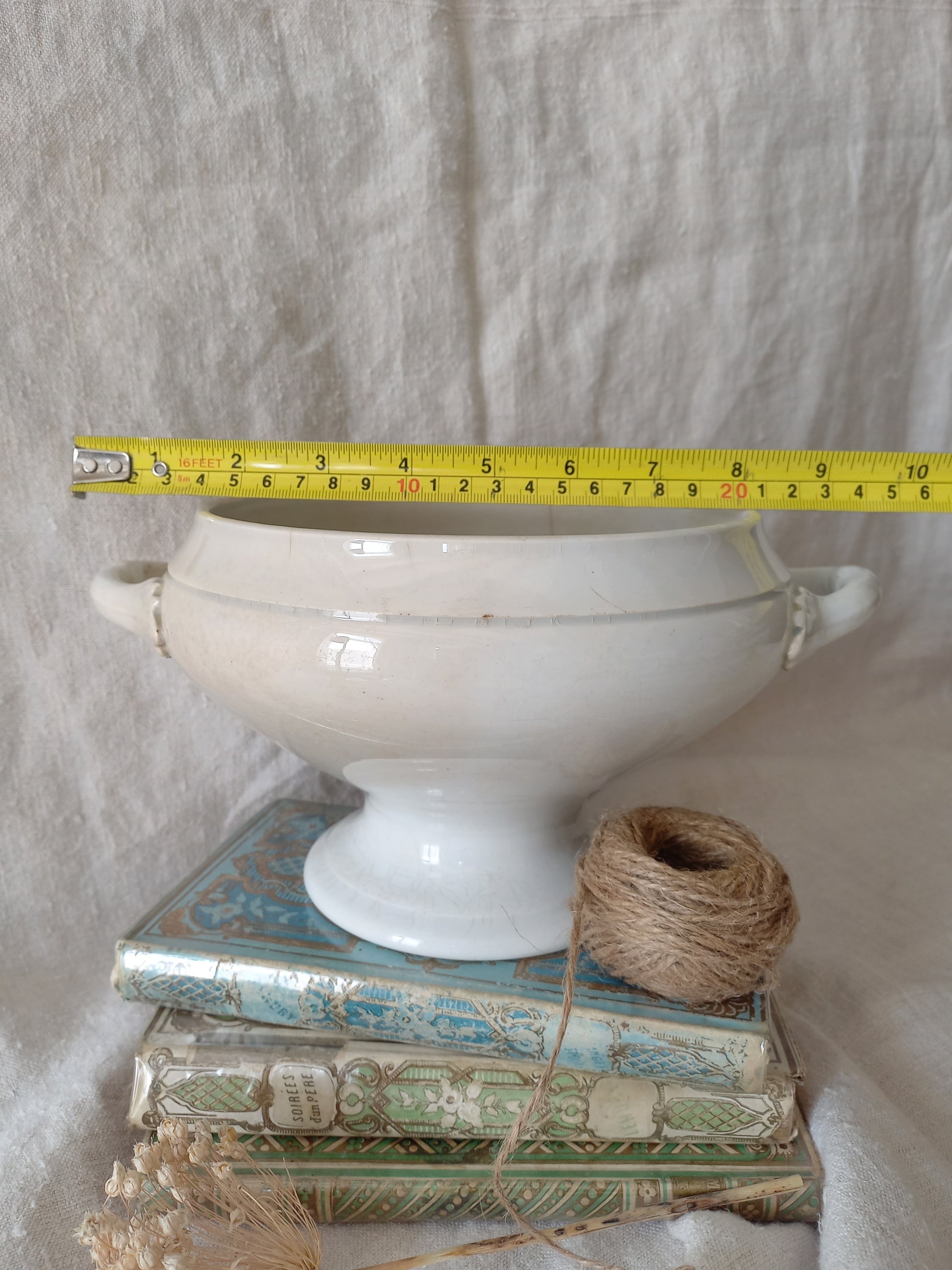 White ironstone bowl with a tape measure for reference.