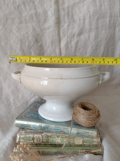 White ironstone bowl with a tape measure for reference.